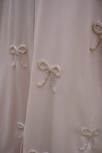 RAML — Bow Abaya